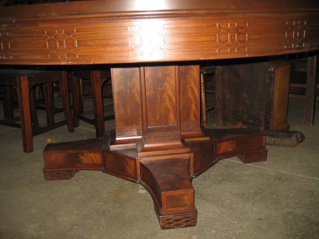 ANTIQUE LARGE ROUND MAHOGANY DINING TABLE WITH SIX LARGE LEAVES AND EIGHT CHAIRS
