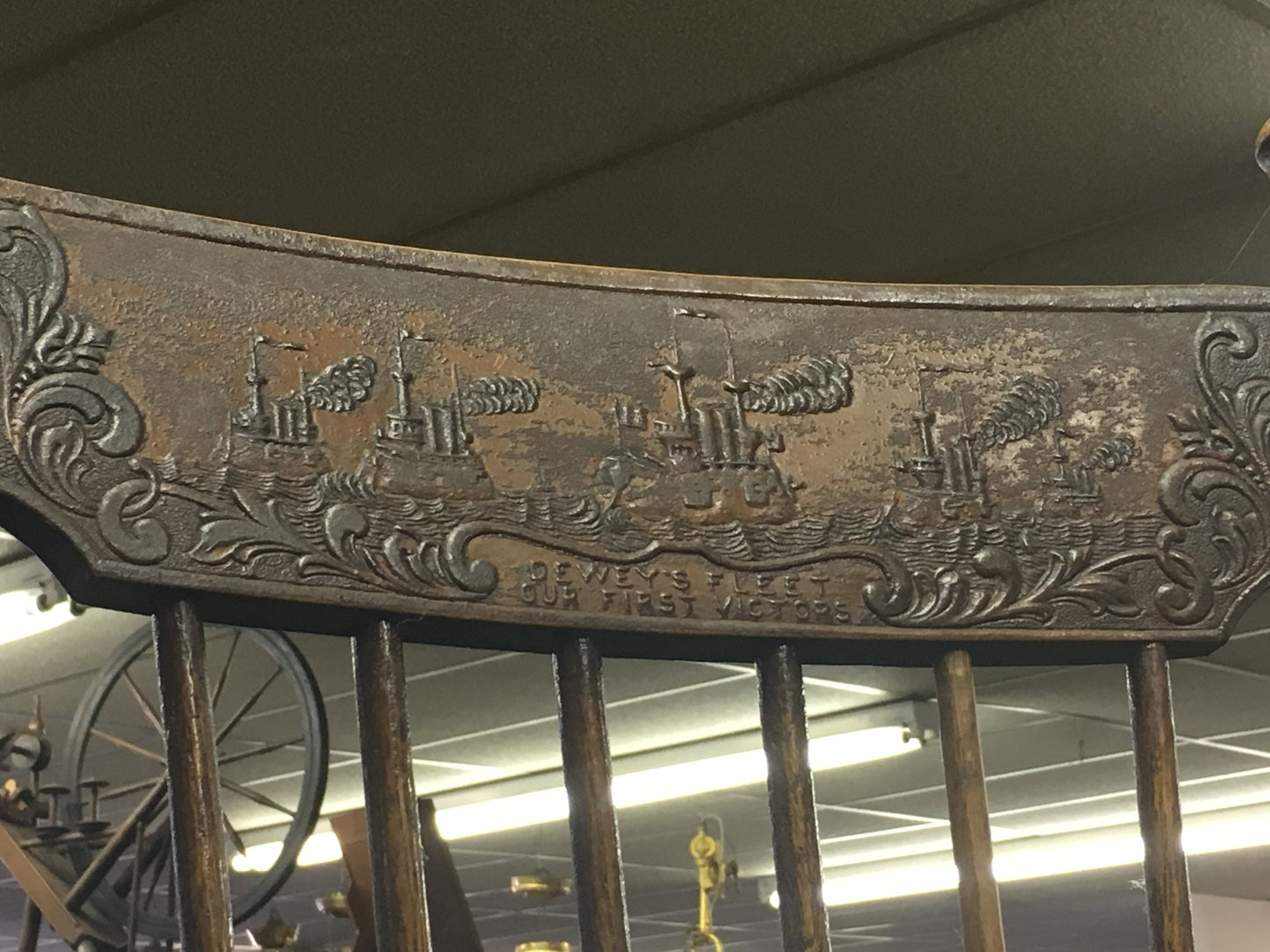 SPANISH AMERICAN WAR COMMEMORATIVE ROCKING CHAIR WITH SCENE OF DEWEY'S FLEET