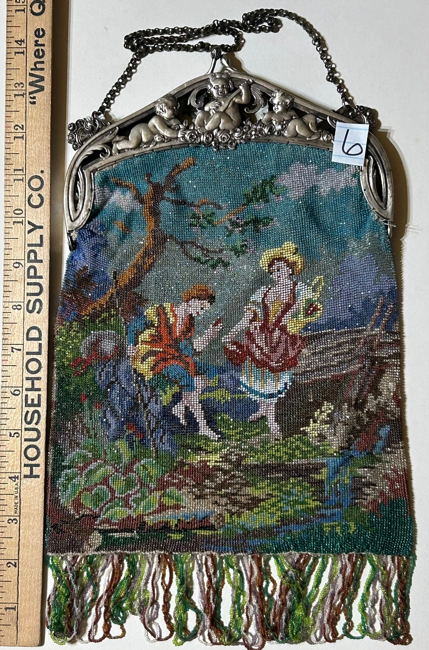 BEADED ANTIQUE LARGE PURSE WITH FIGURES AND SILVER FIGURAL FRAME