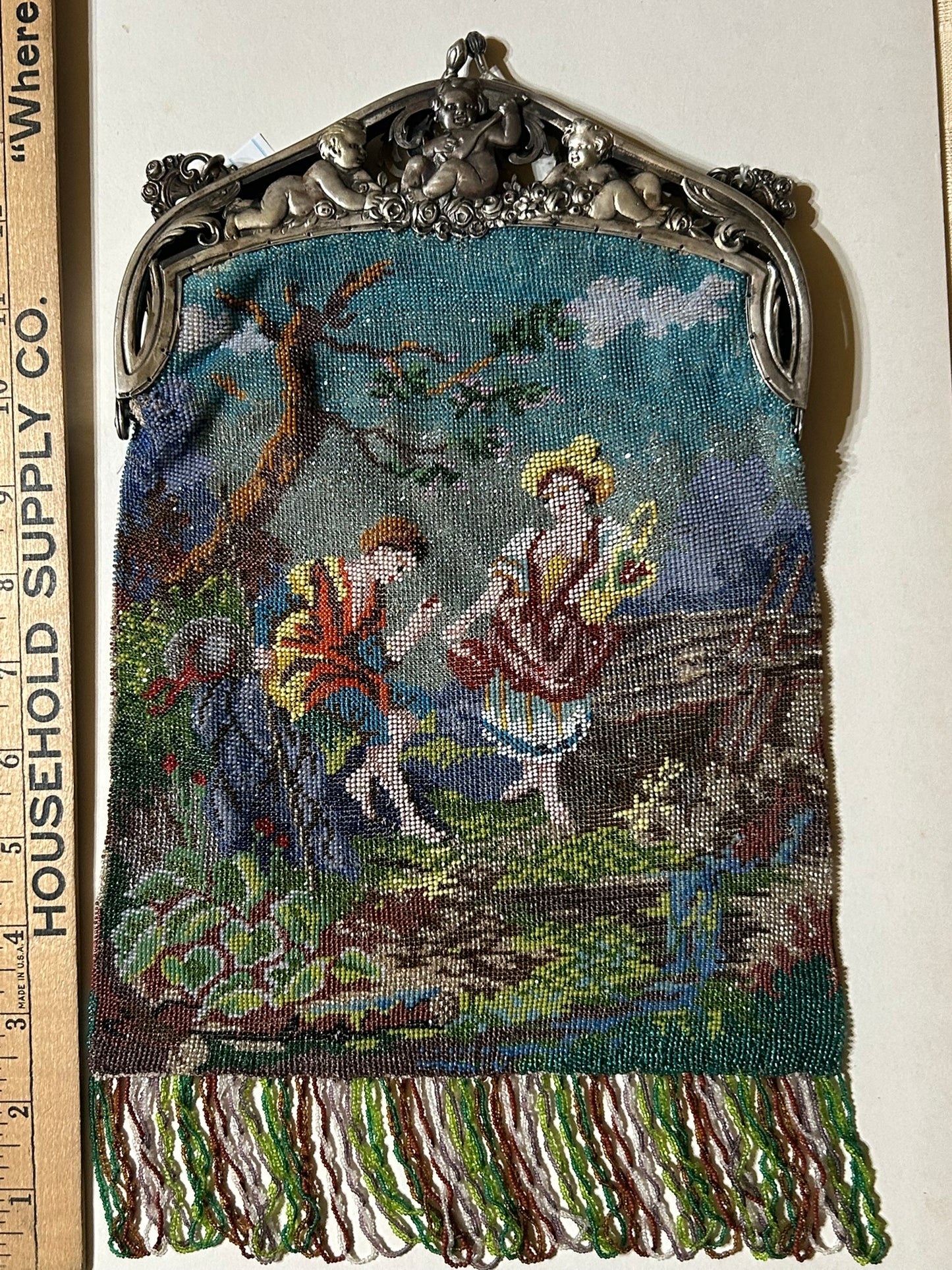 BEADED ANTIQUE LARGE PURSE WITH FIGURES AND SILVER FIGURAL FRAME