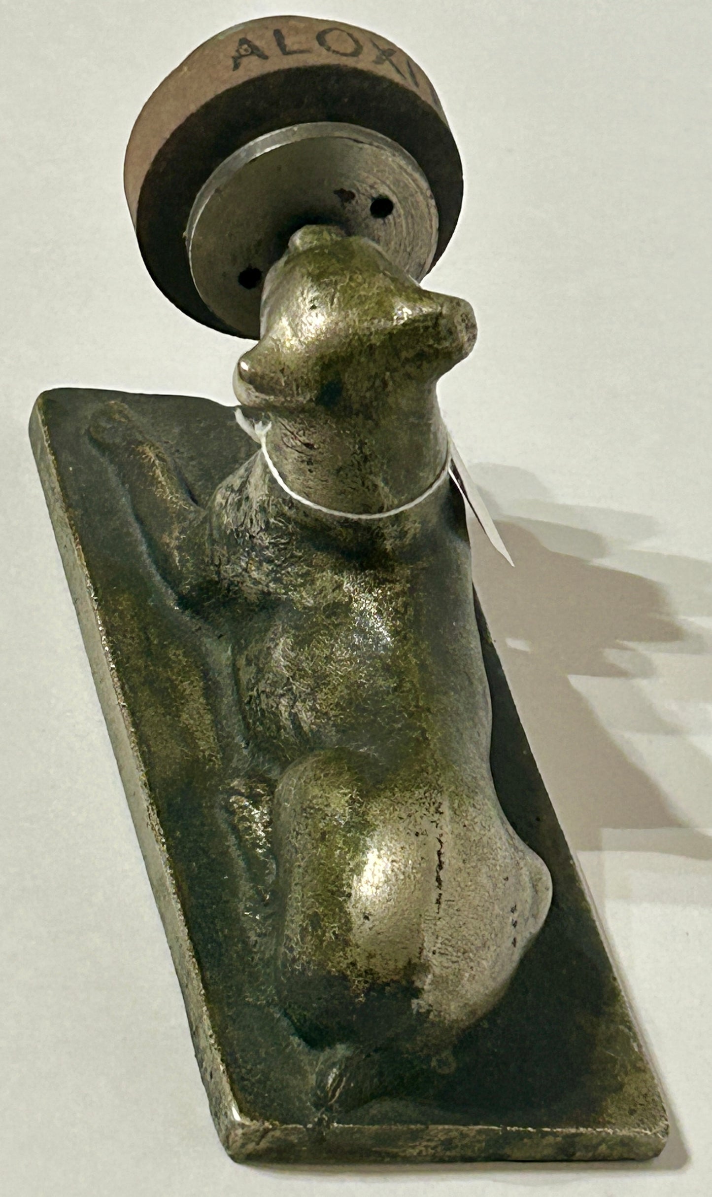 ANTIQUE CAST IRON FIGURAL DOG WITH SHARPENING DISC