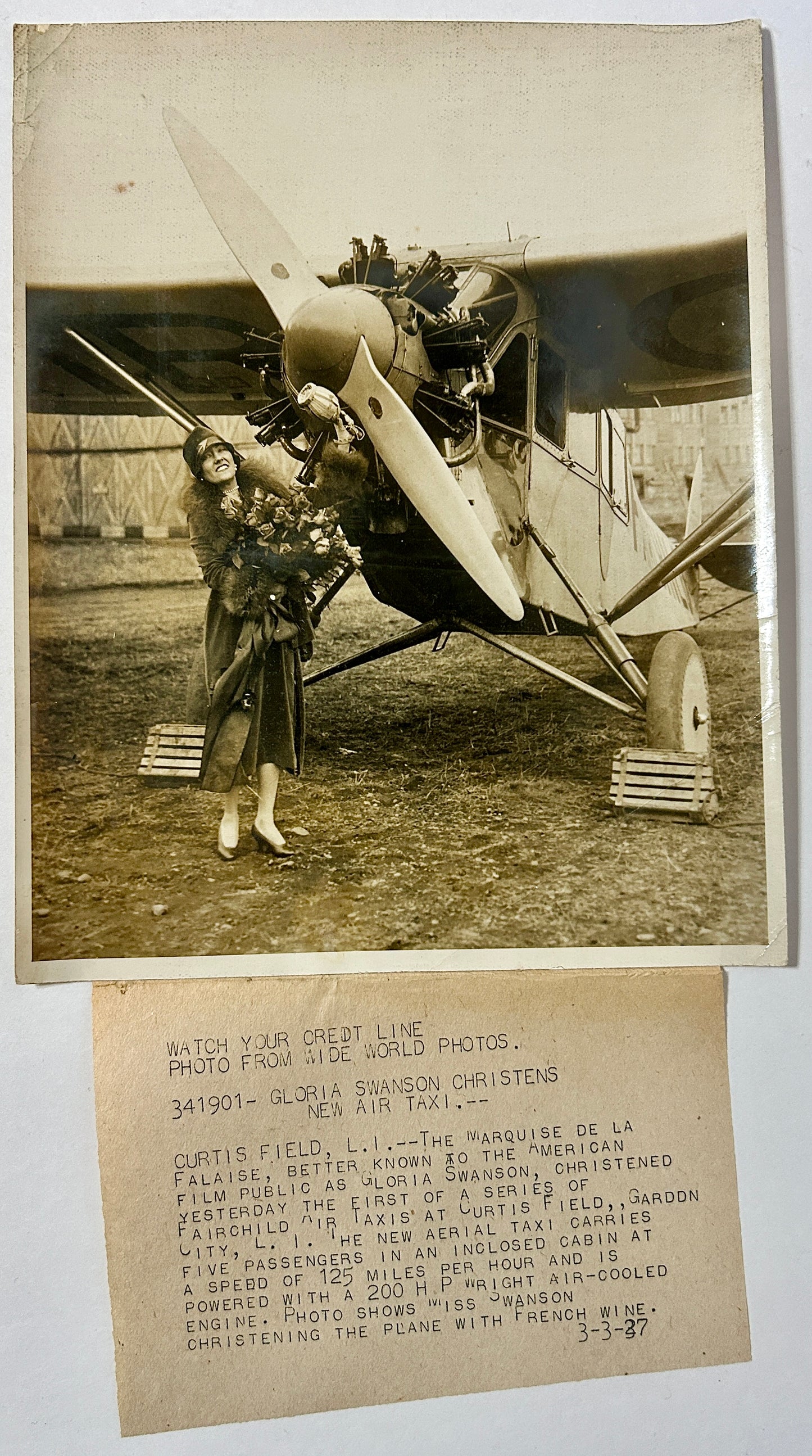 WIRE PHOTO OF GLORIA SWANSON CHRISTENS NEW AIR TAXI AIRPLANE 1927