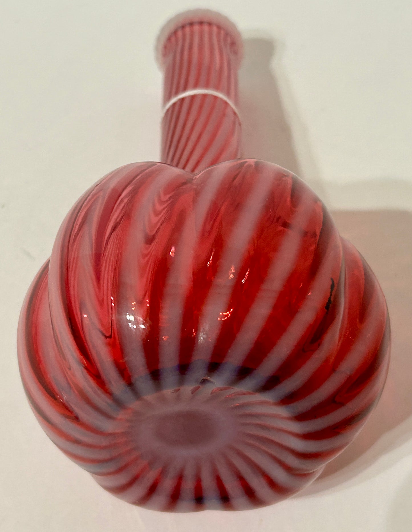 BARBER BOTTLE IN CRANBERRY OPALESCENT SWIRL GLASS