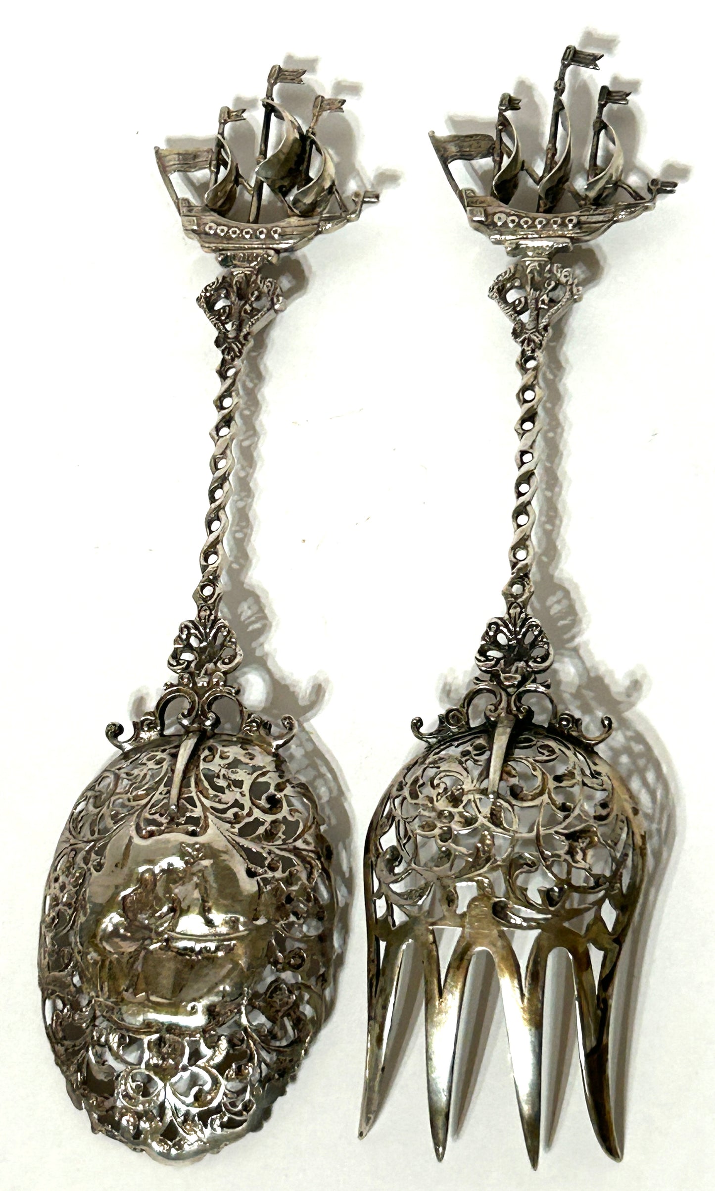 SILVER FANCY RETICULATED SERVING FORK AND SPOON WITH SHIP FINIALS