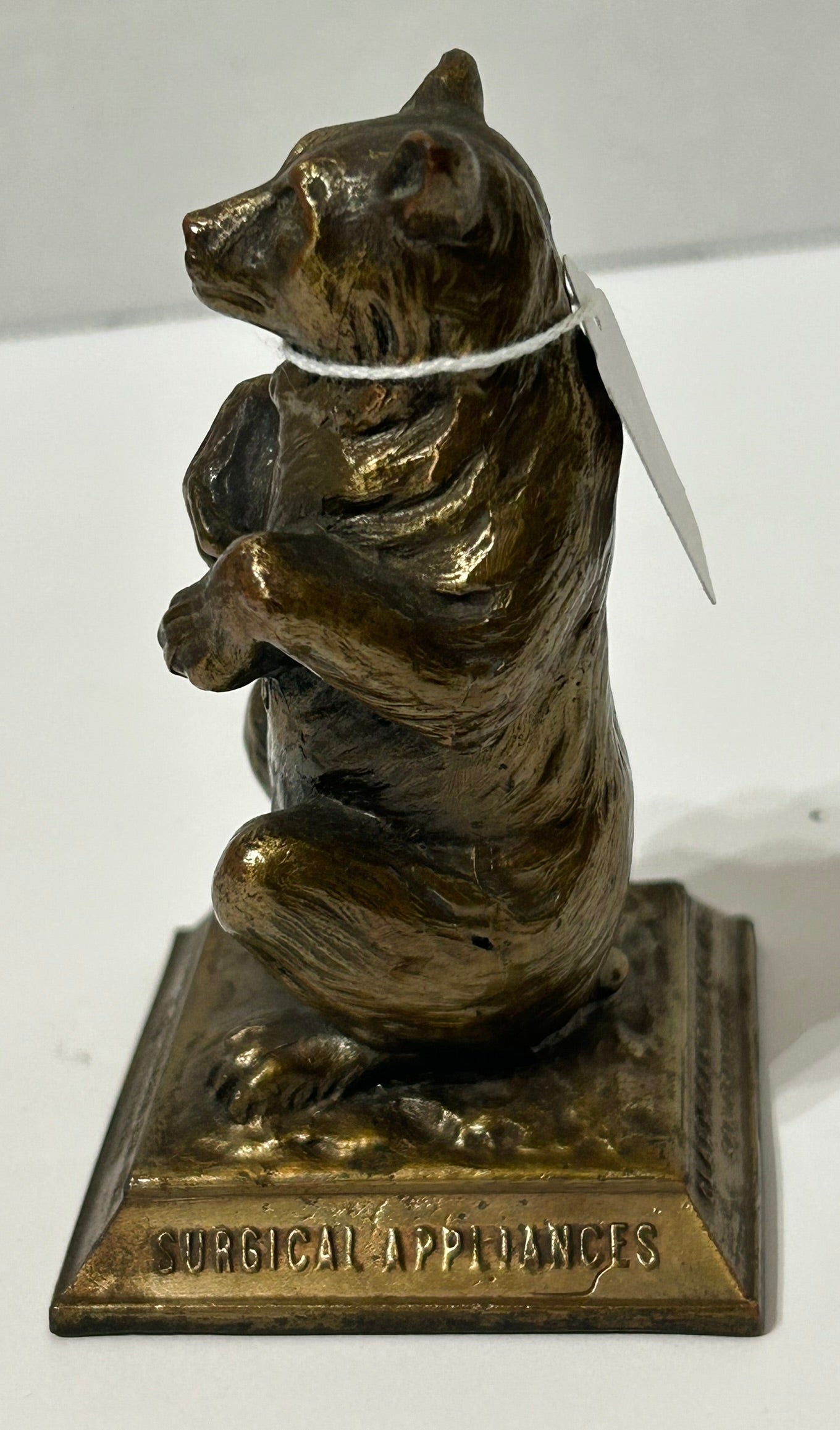 BEAR ADVERTISING ANTIQUE IRON FIGURAL PAPERWEIGHT