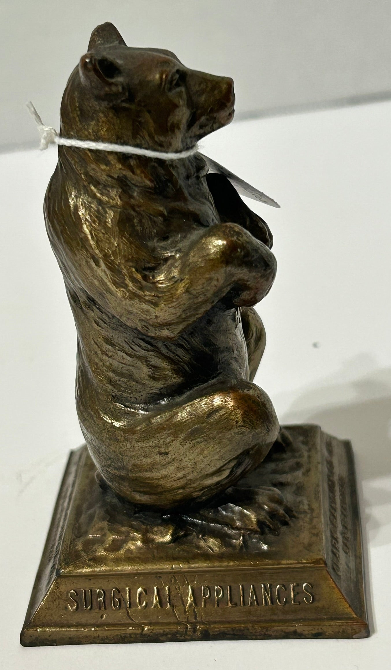 BEAR ADVERTISING ANTIQUE IRON FIGURAL PAPERWEIGHT