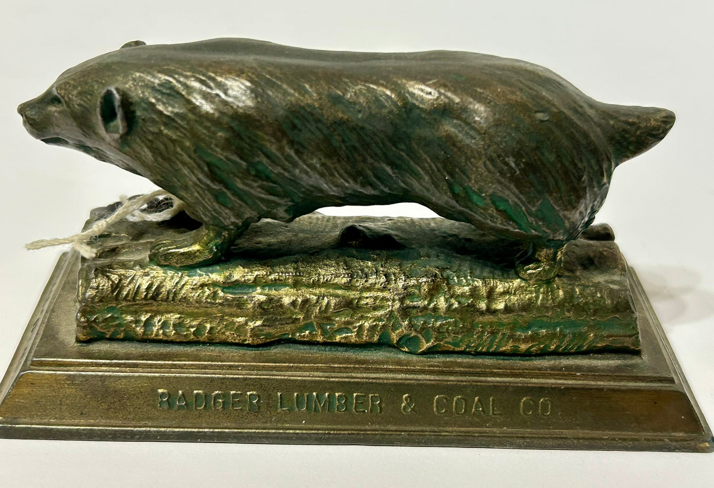 BADGER FIGURAL METAL ANTIQUE ADVERTISING PAPERWEIGHT FOR BADGER LUMBER & COAL CO.