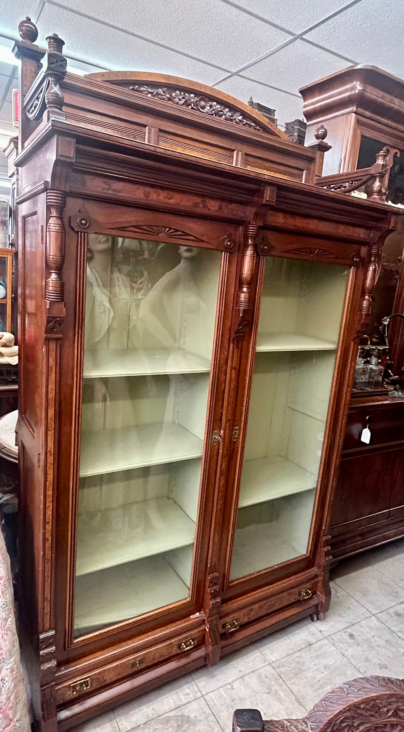 WALNUT VICTORIAN BOOKCASE WITH BURL ACCENTS