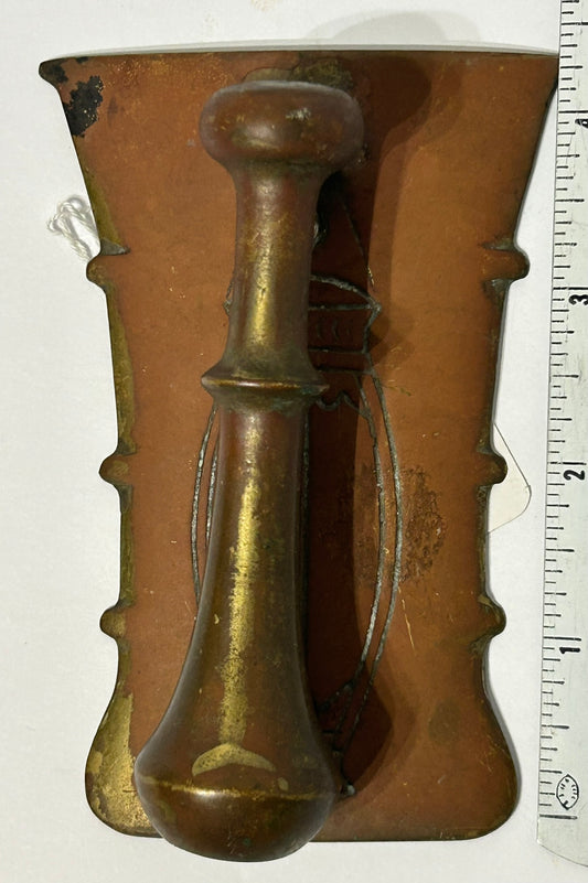 DOOR KNOCKER SHAPED LIKE BRONZE MORTAR AND PESTLE