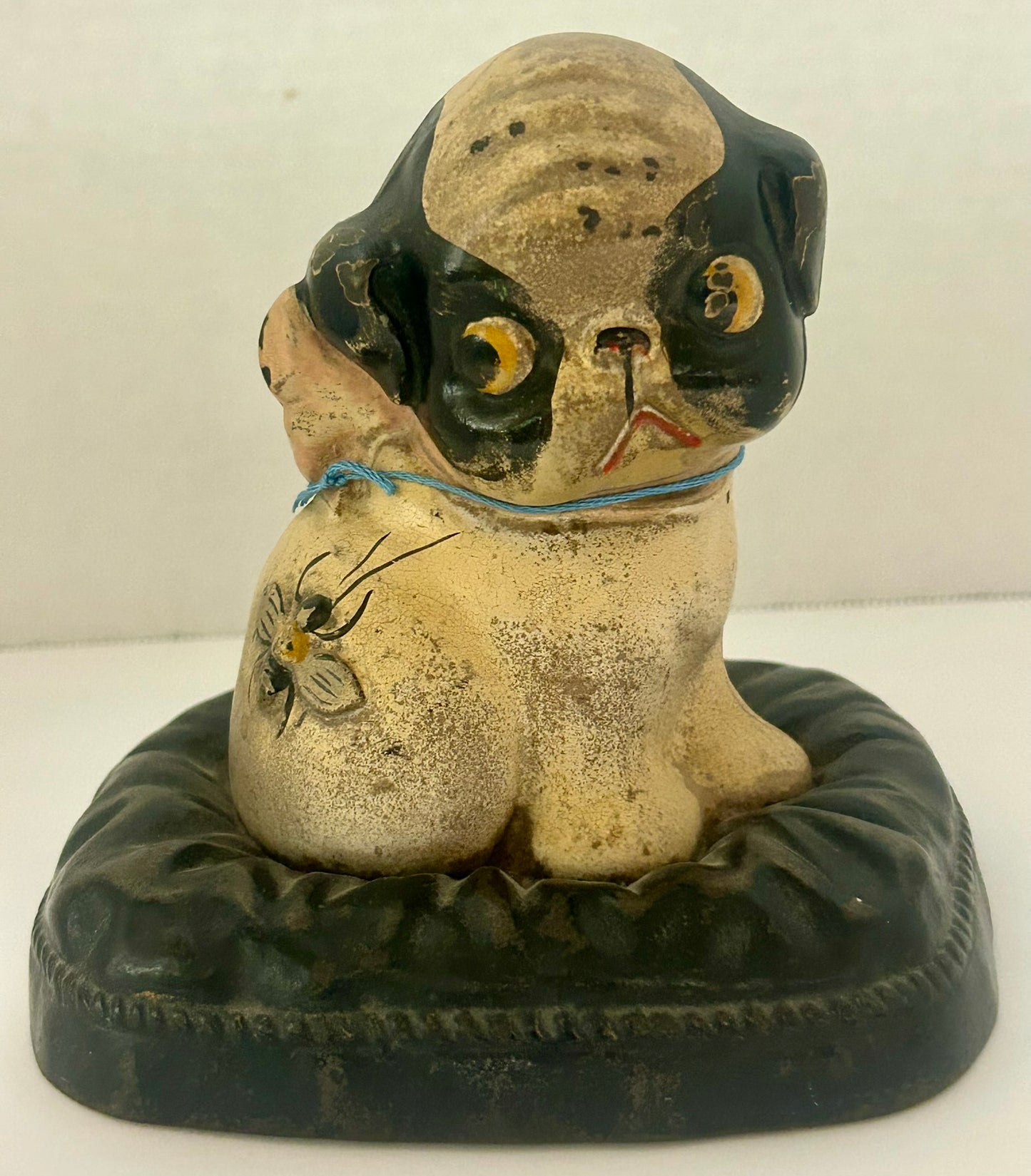 ANTIQUE CAST IRON BANK FIDO ON A PILLOW