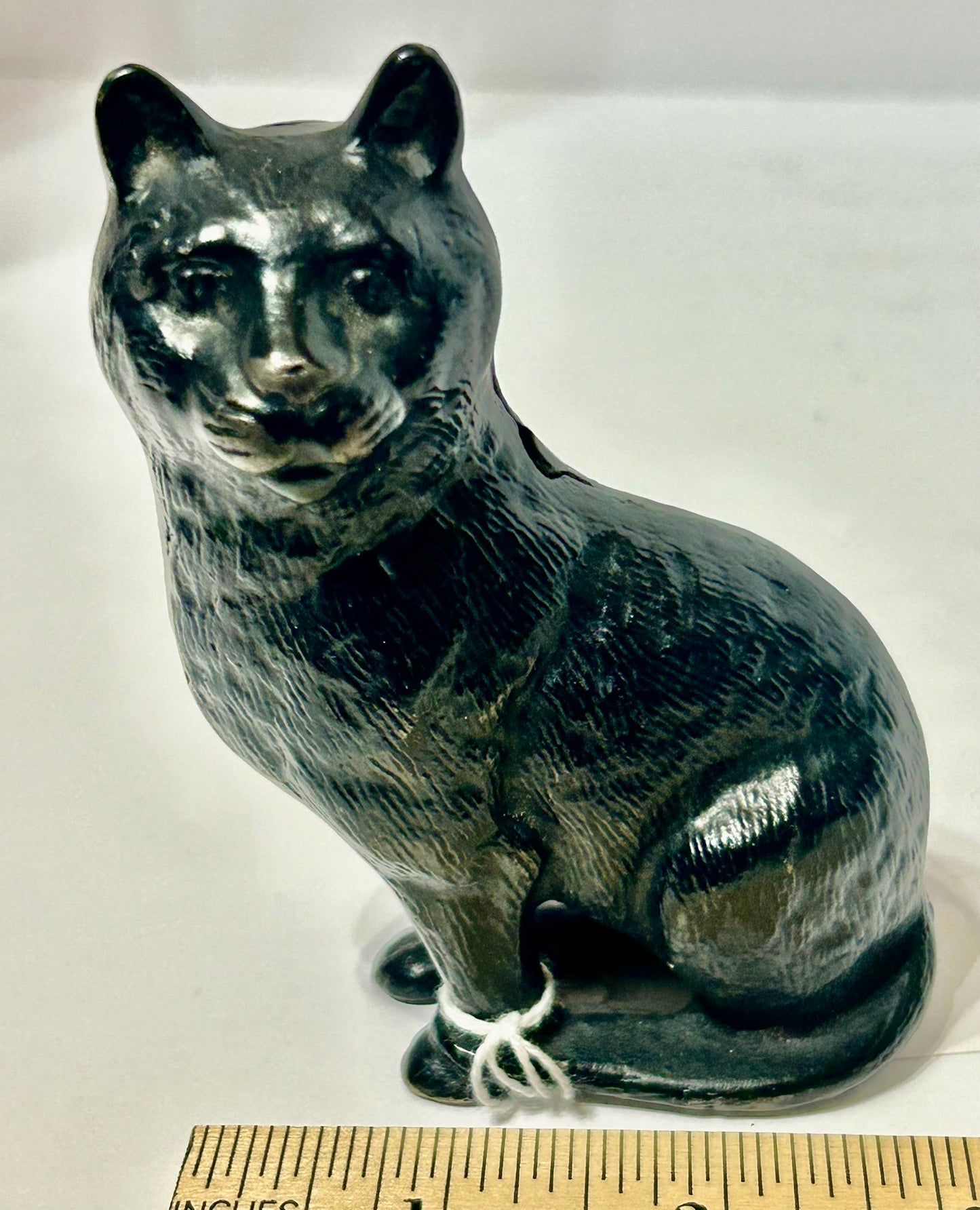 ANTIQUE IRON SEATED CAT STILL BANK