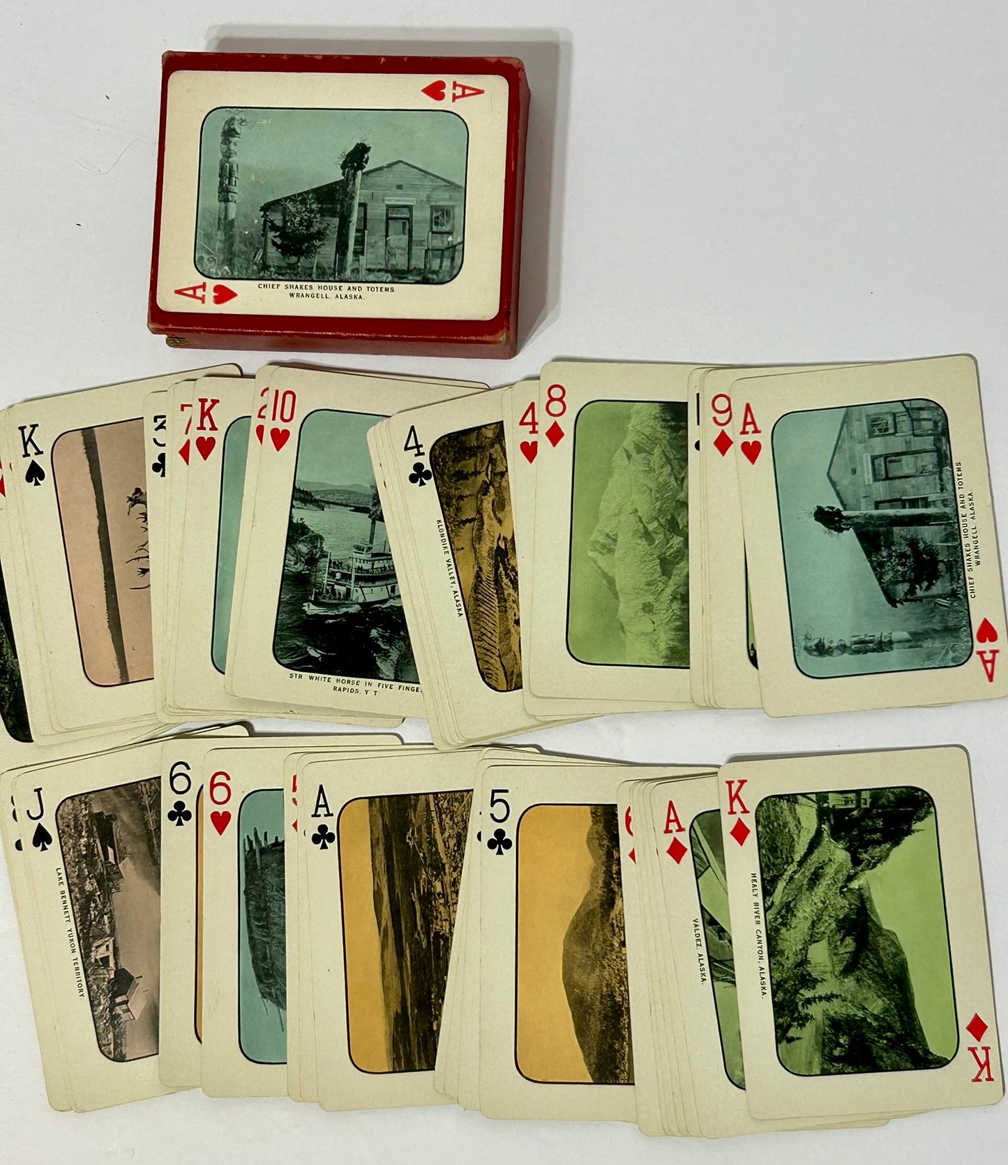 ANTIQUE PLAYING CARDS WITH SCENES OF ALASKA