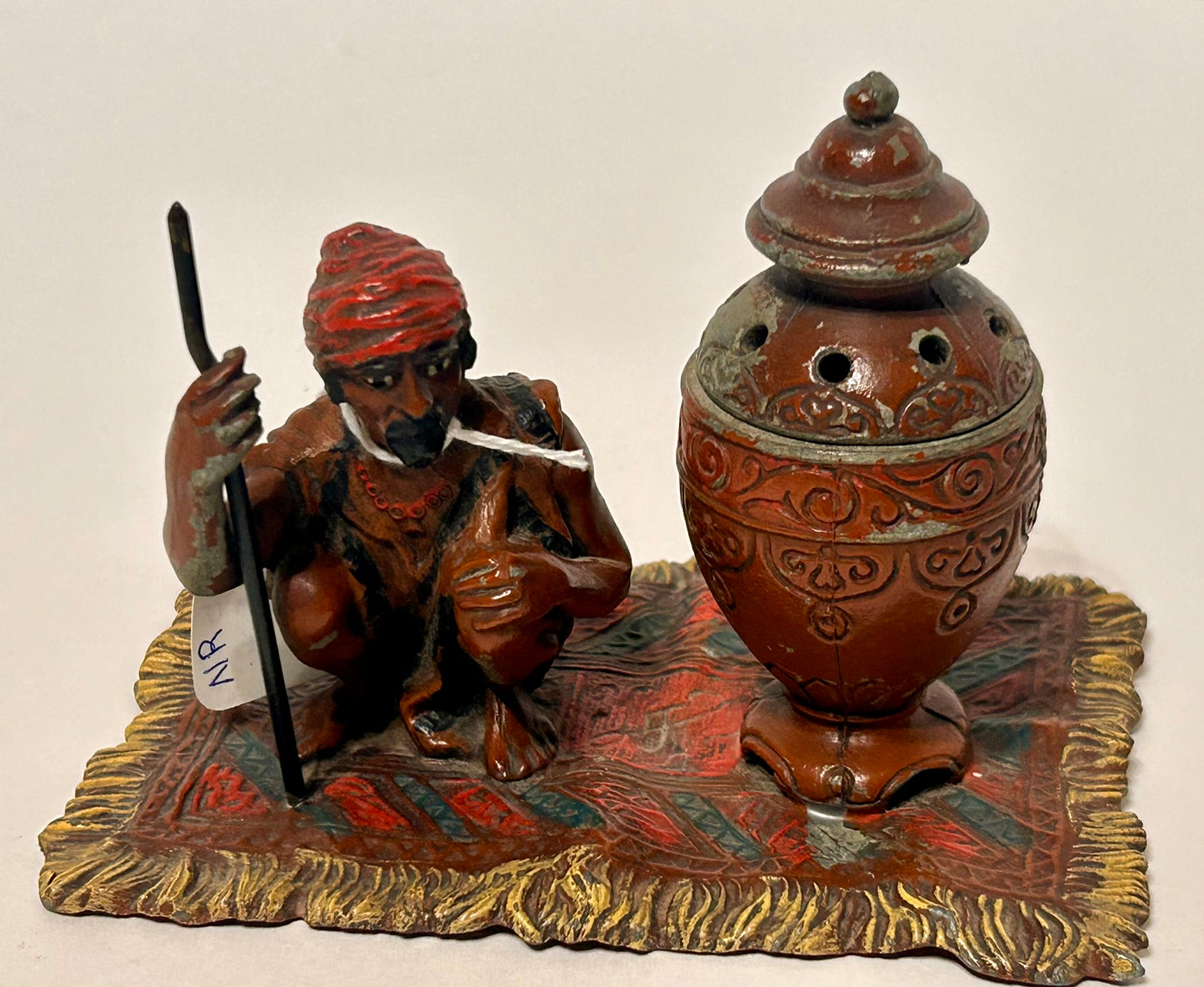 ARAB ON RUG METAL INCENSE BURNER