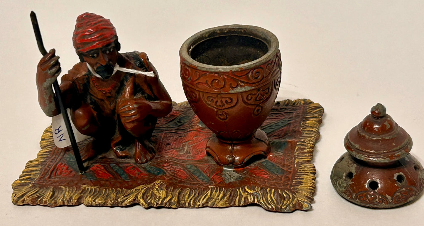 ARAB ON RUG METAL INCENSE BURNER