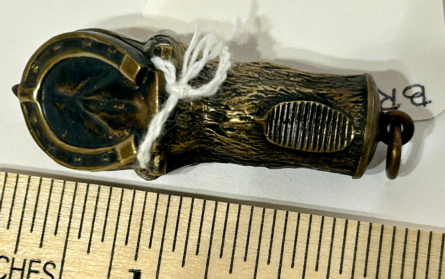 ANTIQUE MATCH HOLDER SHAPED LIKE HORSE HOOF