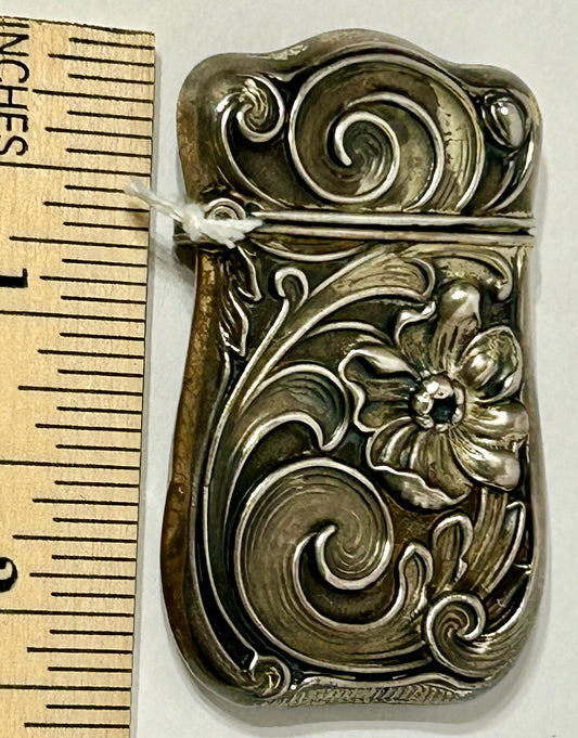 ANTIQUE MATCH SAFE WITH FANCY STERLING DESIGN