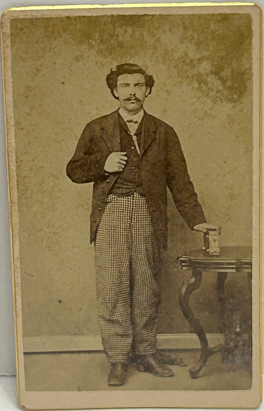 ANTIQUE CDV PHOTO OF MAN WITH PHOTO ALBUM ON TABLE