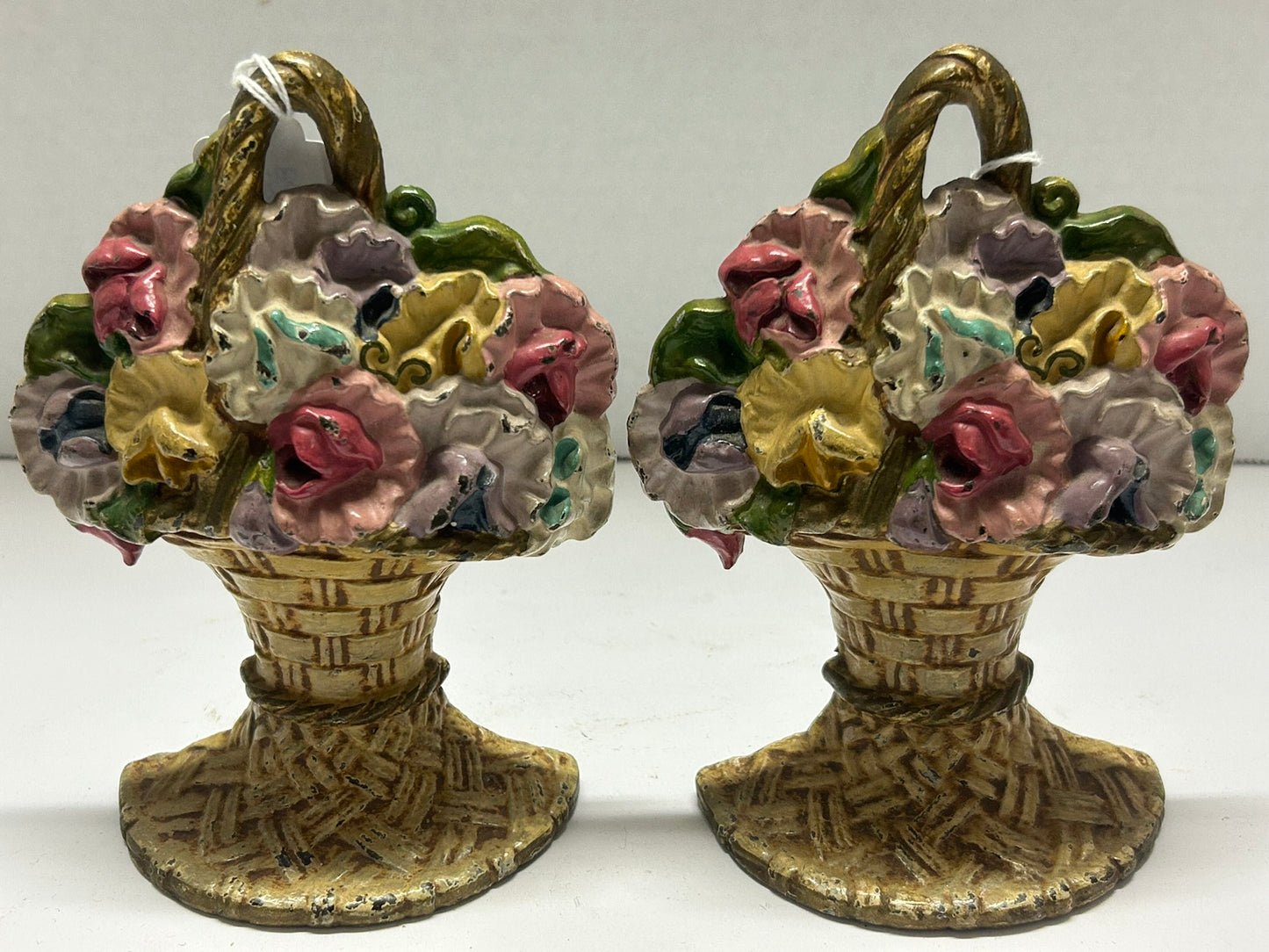 CAST IRON BOOKENDS OF FLOWERS IN BASKET