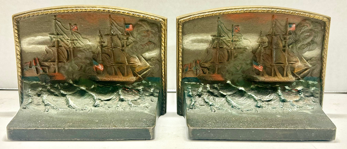 CAST IRON BOOKENDS OF CONSTITUTION SHIP IN BATTLE BY BRADLEY AND HUBBARD