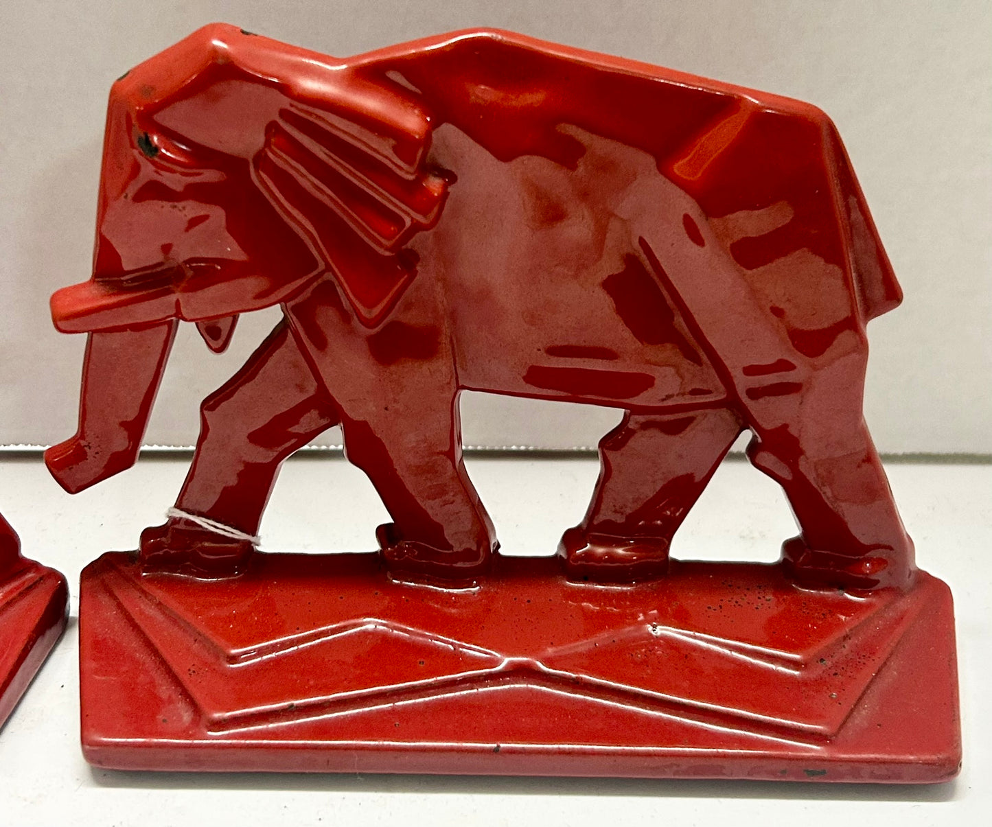 ELEPHANT IRON BOOKENDS WITH RED PORCELAIN ENAMEL FINISH