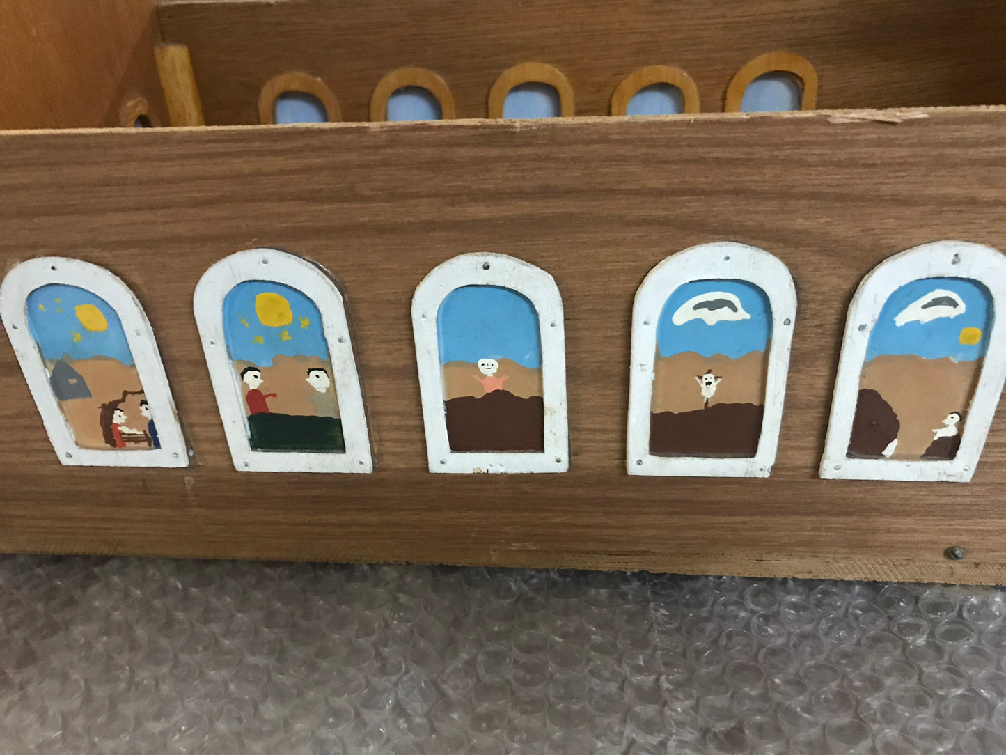 FOLK ART CHURCH INTERIOR WITH PEOPLE