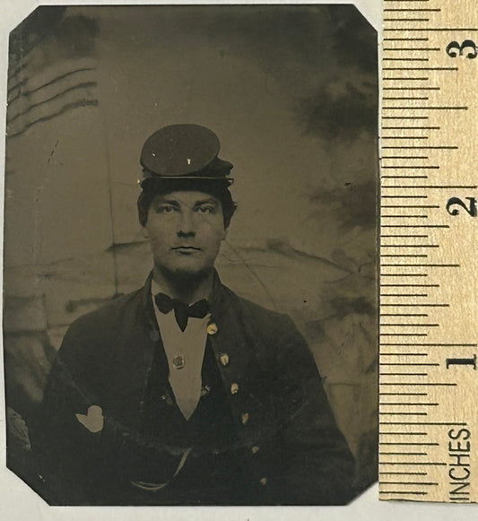 CIVIL WAR SOLDIER WITH KEPI HAT AND FLAG BACKGROUNDM TINTYPE