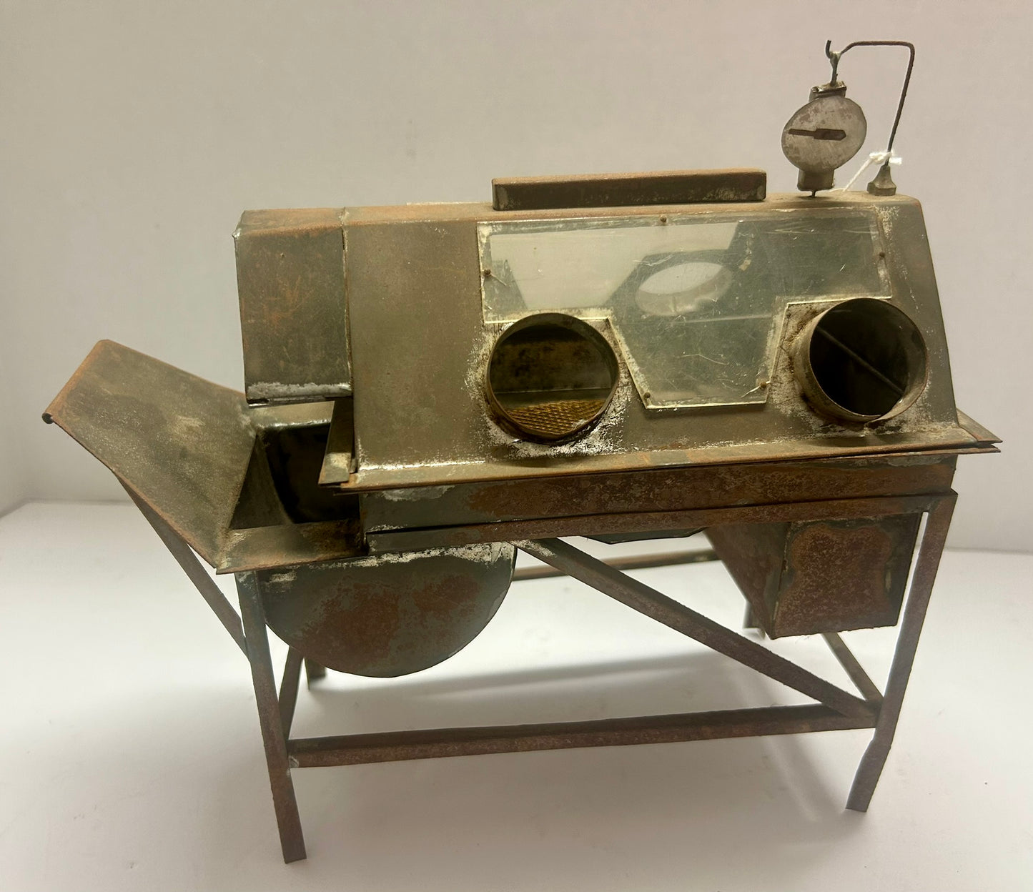 SAMPLE OR MODEL OF EARLY SAND BLASTING MACHINE