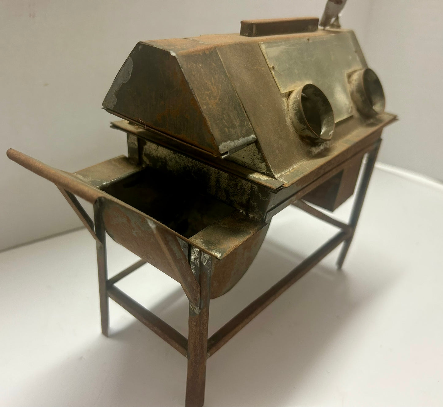 SAMPLE OR MODEL OF EARLY SAND BLASTING MACHINE