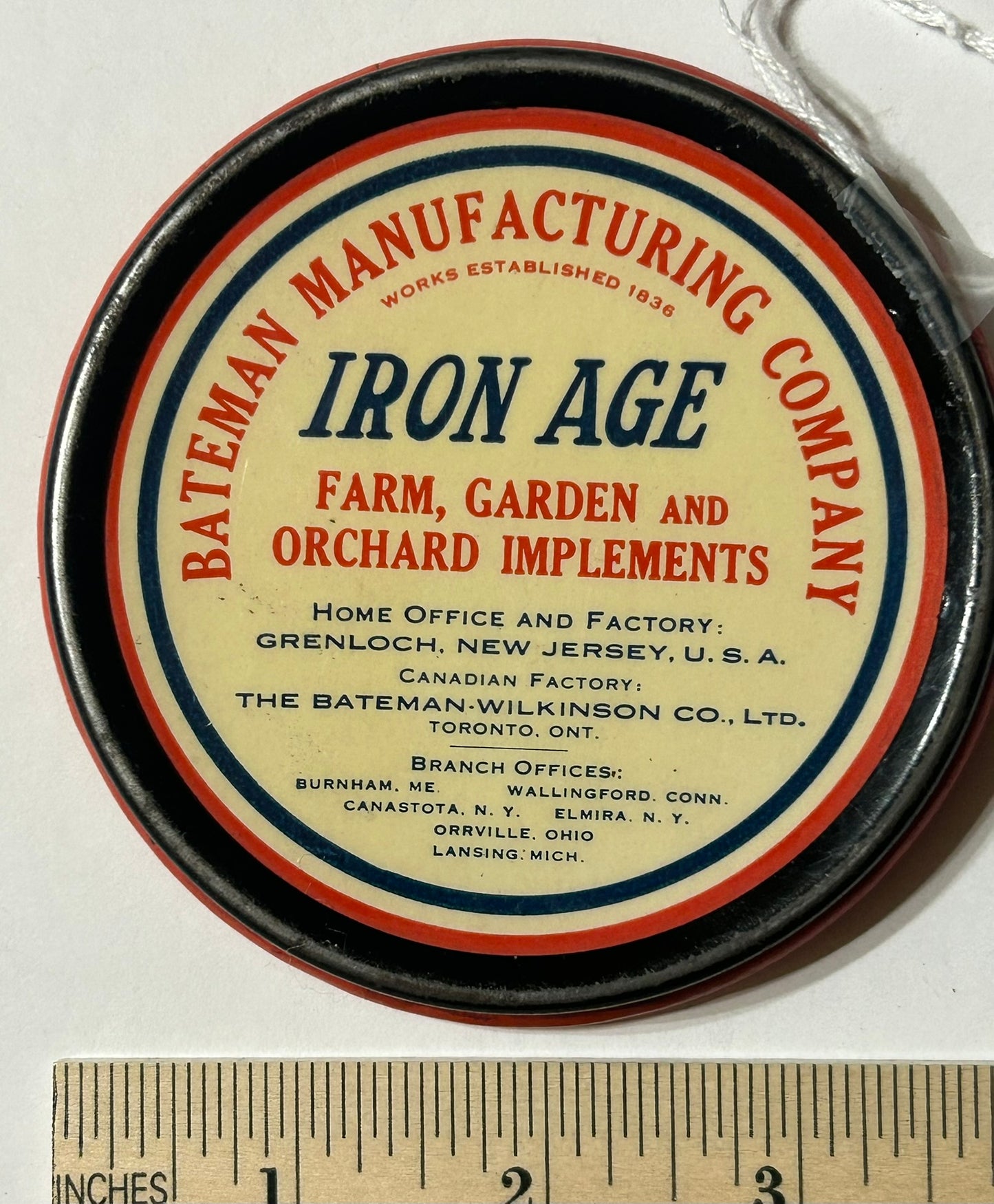 IRON AGE LARGE ADVERTISING ANTIQUE PAPERWEIGHT 4" DIA.