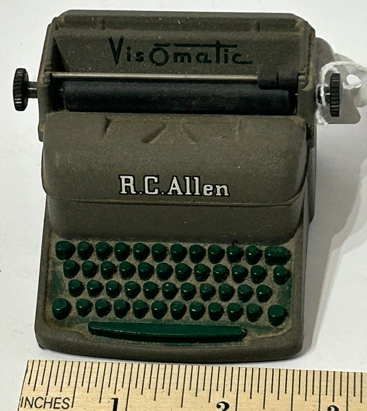 R.C. ALLEN TYPEWRITER ADVERTISING FIGURAL PAPERWEIGHT