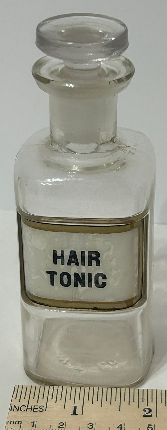 DRUGGIST BOTTLE WITH LABEL UNDER GLASS FOR "HAIR TONIC"