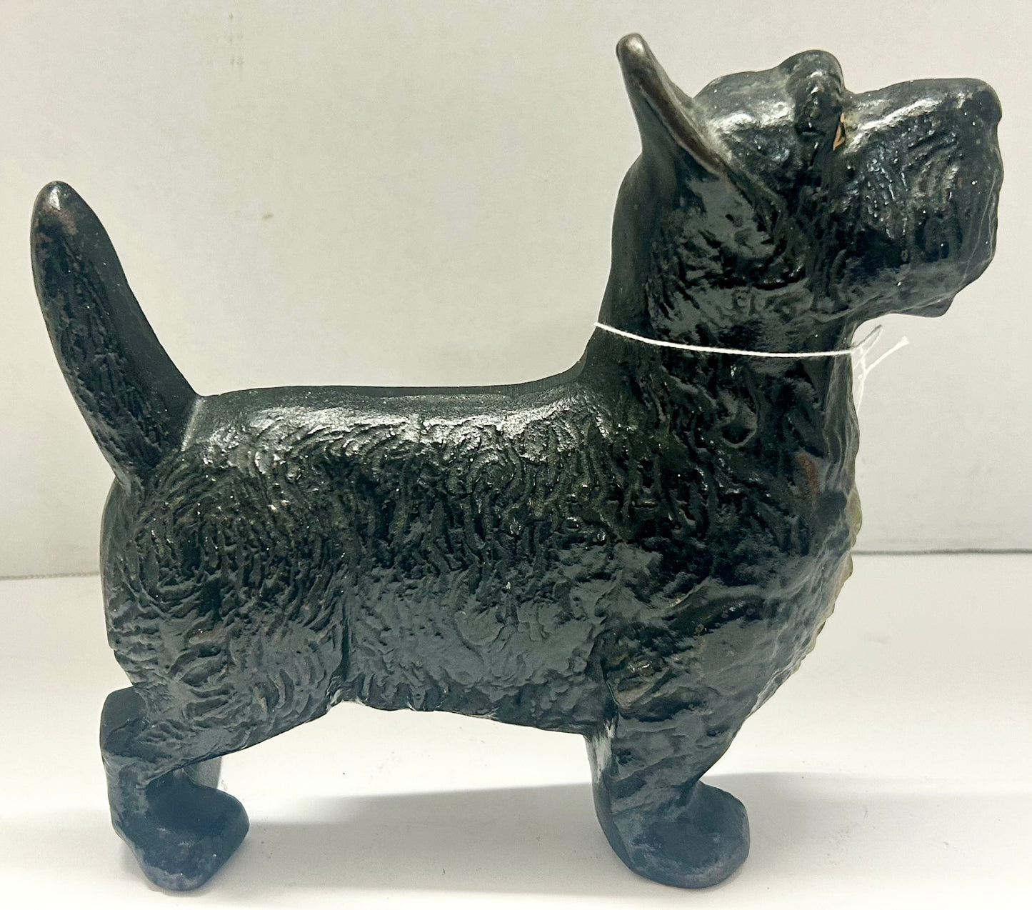 ANTIQUE DOORSTOP OF CAST IRON STANDING SCOTTY DOG
