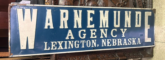 LEXINGTON, NEBRASKA WARNEMUNDE AGENCY ANTIQUE TIN ADVERTISING SIGN