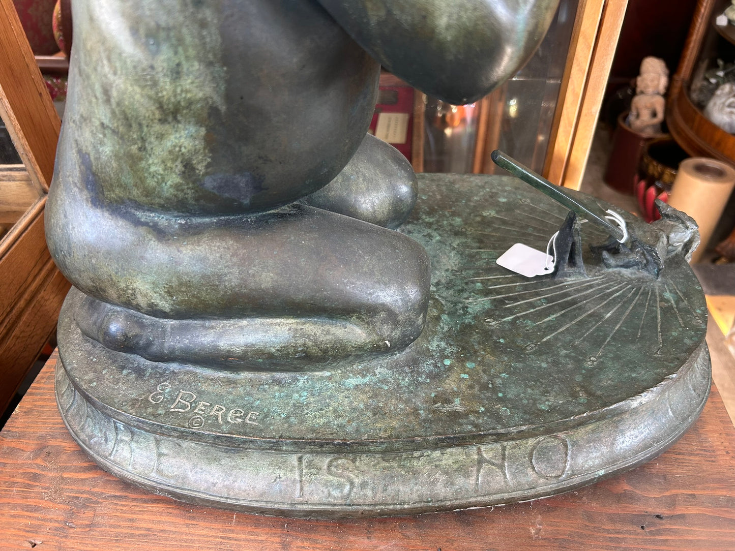 Edward Berge bronze figural sundial