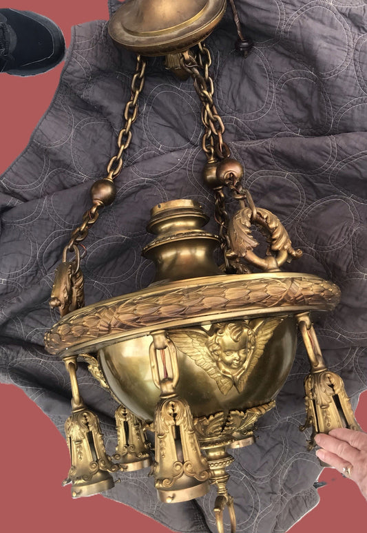 LARGE BRASS HANGING ANTIQUE LIGHT FIXTURE WITH CHERUB HEADS