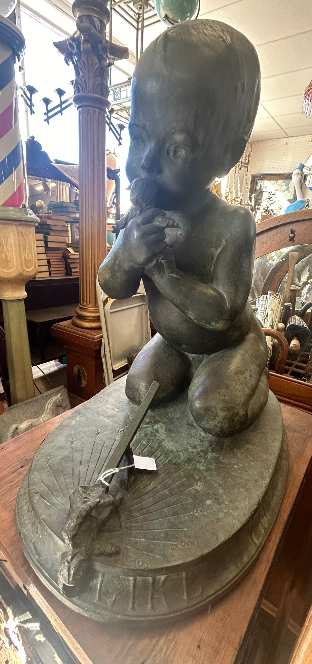 Edward Berge bronze figural sundial