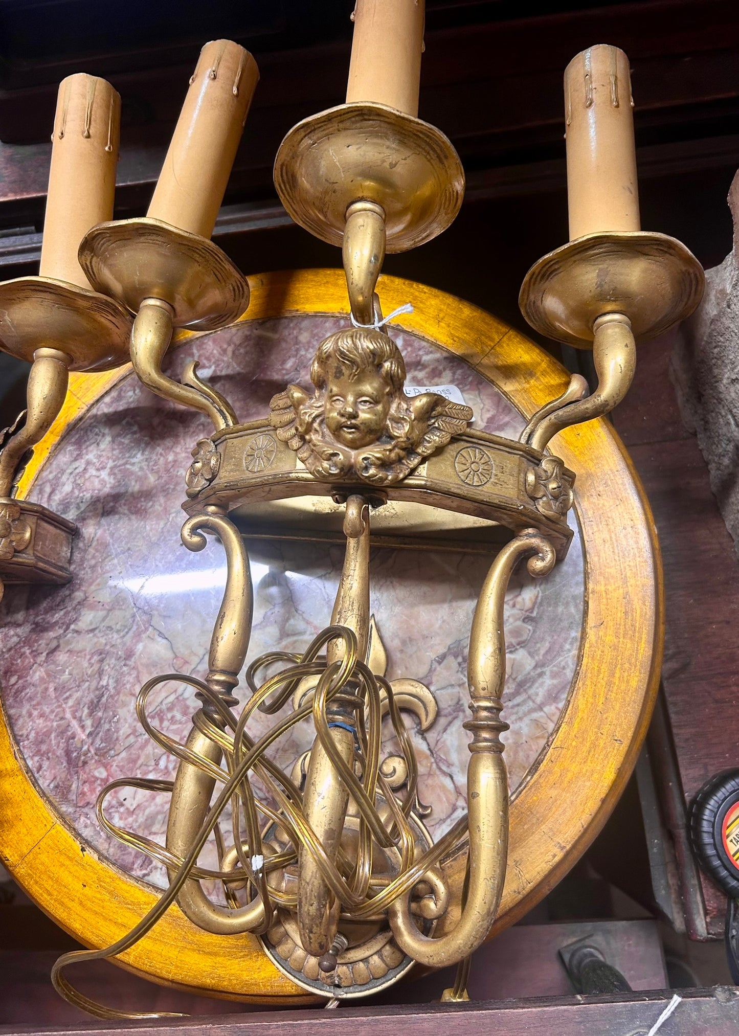ANTIQUE PAIR OF BRASS WALL SCONCES WITH ANGEL FACES