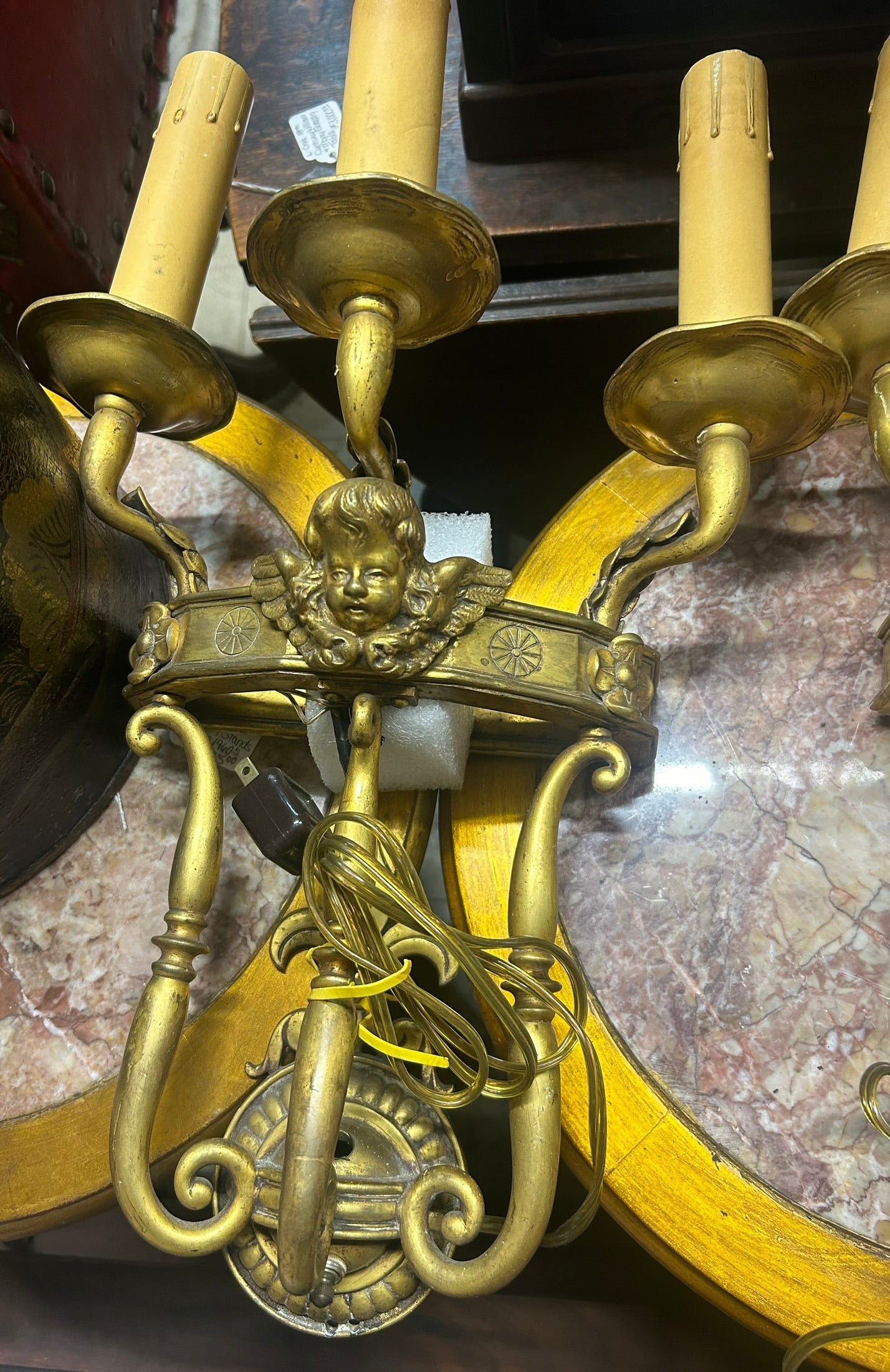 ANTIQUE PAIR OF BRASS WALL SCONCES WITH ANGEL FACES