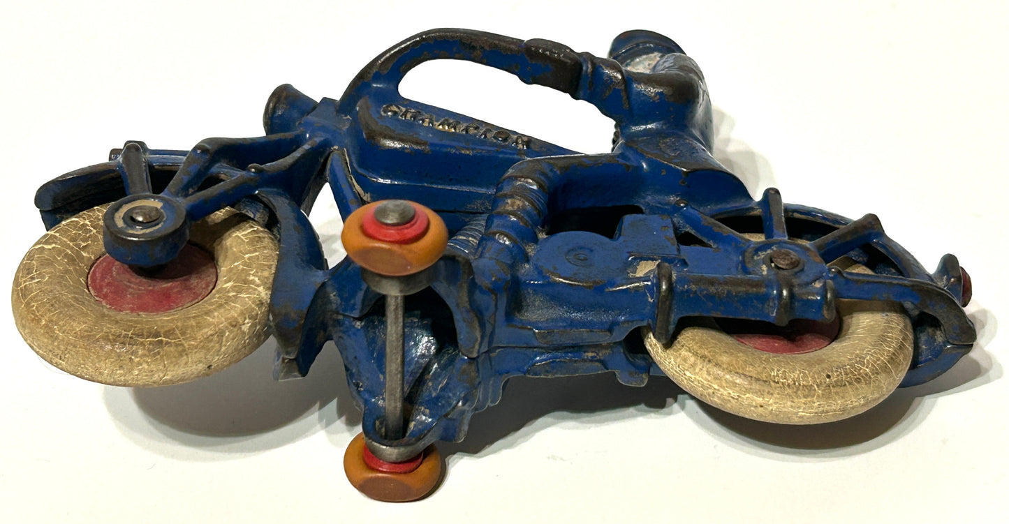 ANTIQUE CAST IRON CHAMPION TOY MOTORCYCLE