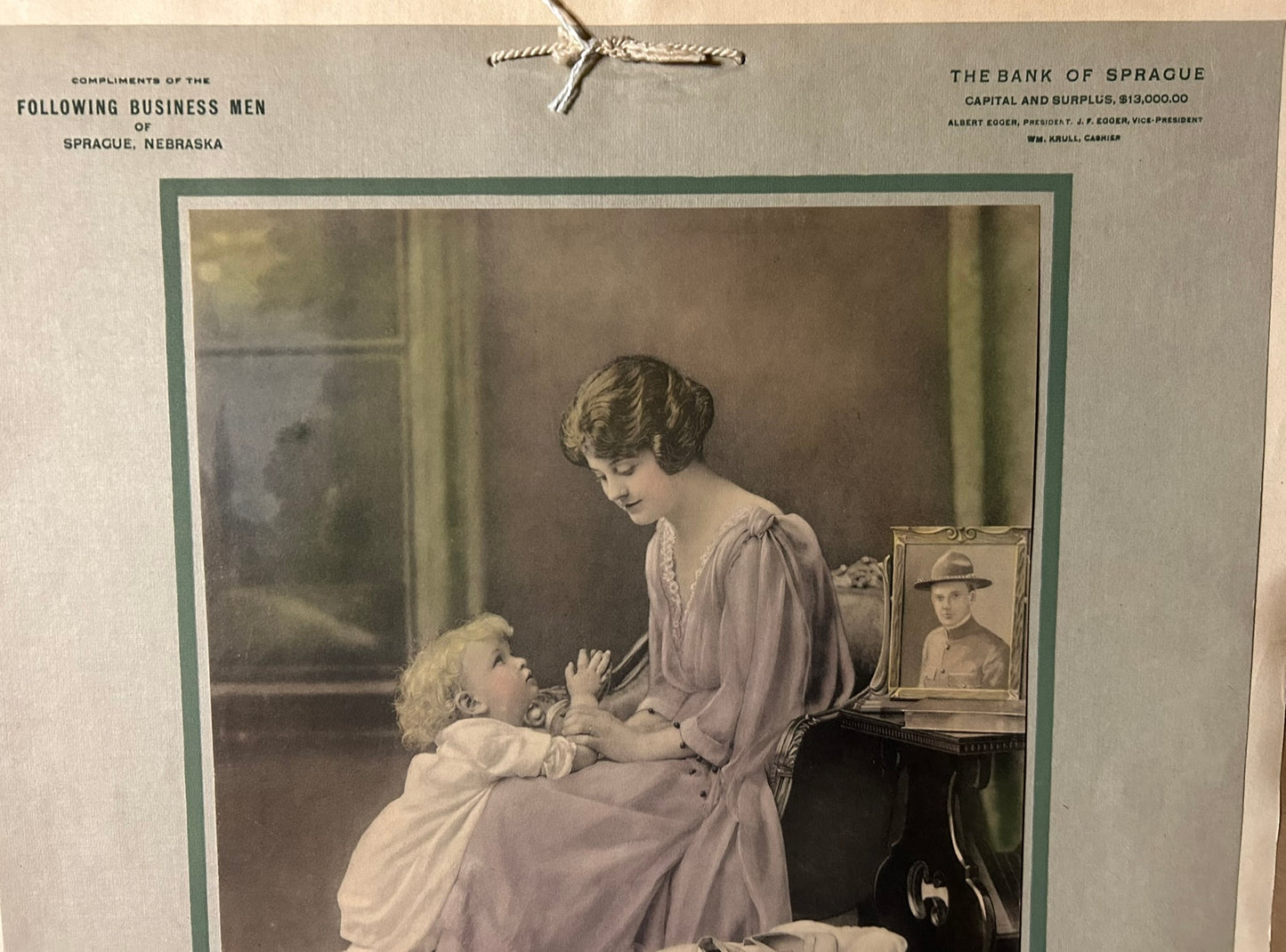 SPRAGUE NEBRASKA 1920 ADVERTISING CALENDAR WITH WOMAN AND CHILD