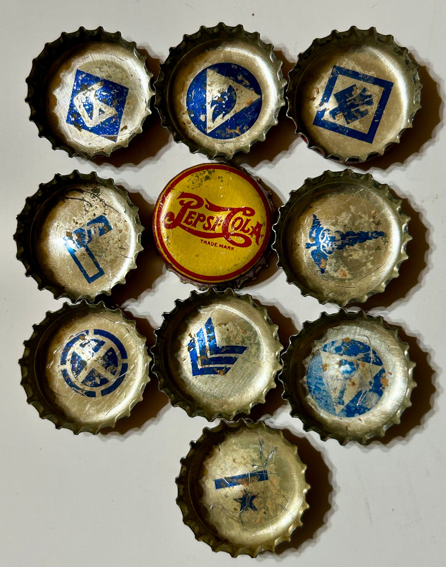 1930'S PEPSI RARE BOTTLE CAPS WITH MILITARY INSIGNIAS INSIDE
