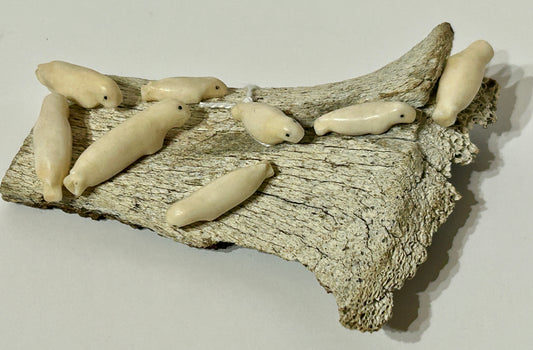 WALRUS IVORY CARVING OF BABY SEALS