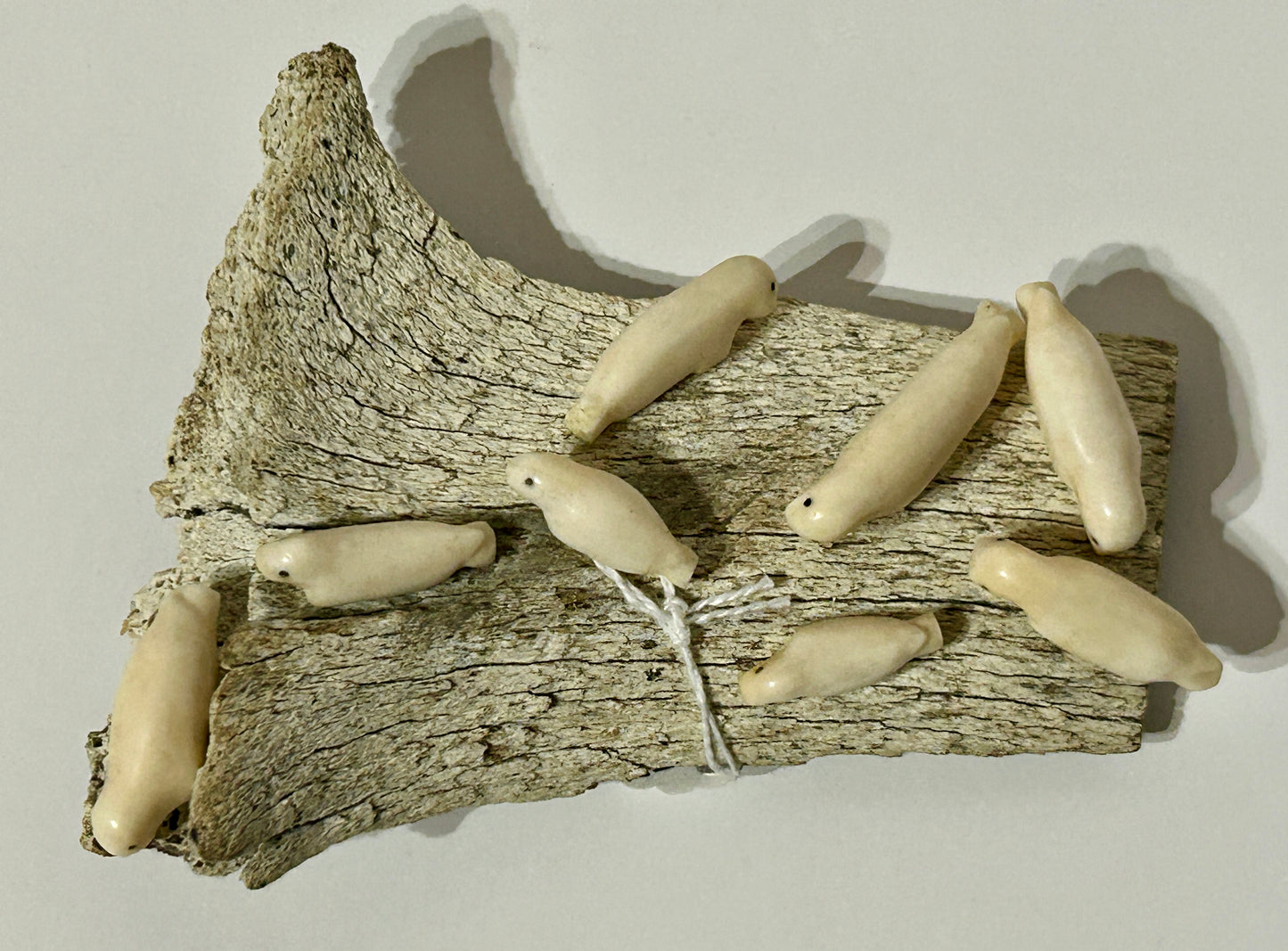 WALRUS IVORY CARVING OF BABY SEALS