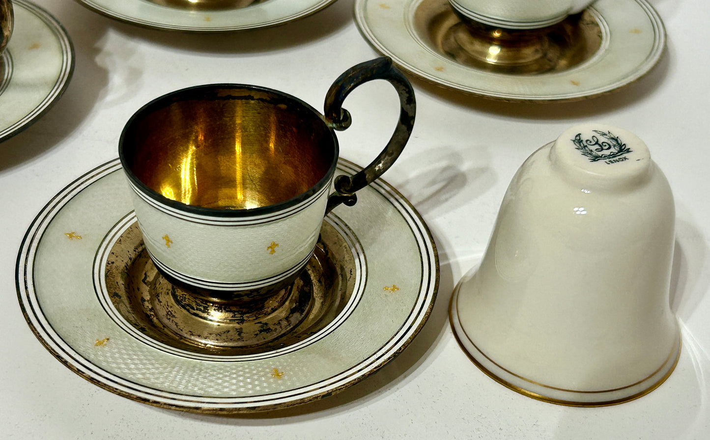 TIFFANY & CO. ENAMEL ON STERLING WITH PORCELAIN DEMITASSE SET