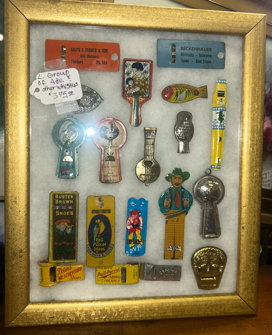 GROUP OF TOY ADVERTISING WHISTLES
