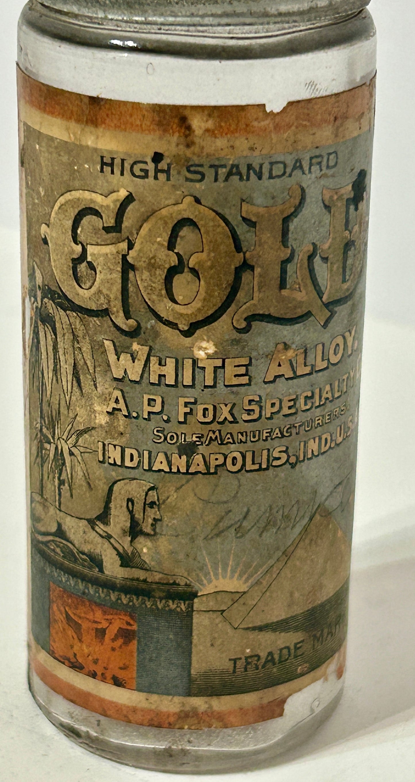 ANTIQUE BOTTLE LABELED GOLD ALLOY