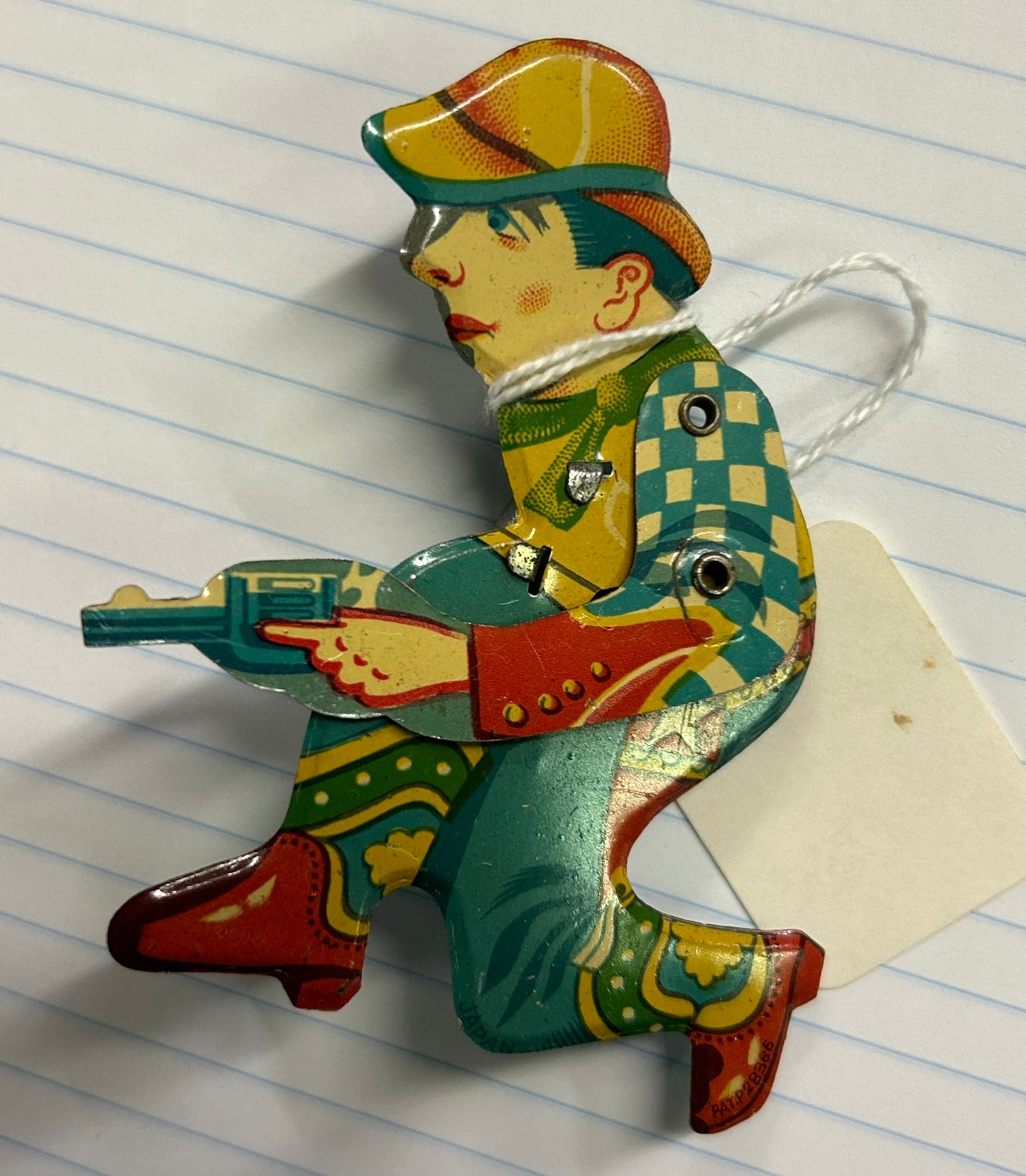 ANTIQUE TIN LITHO COWBOY TOY NOISE CLICKER