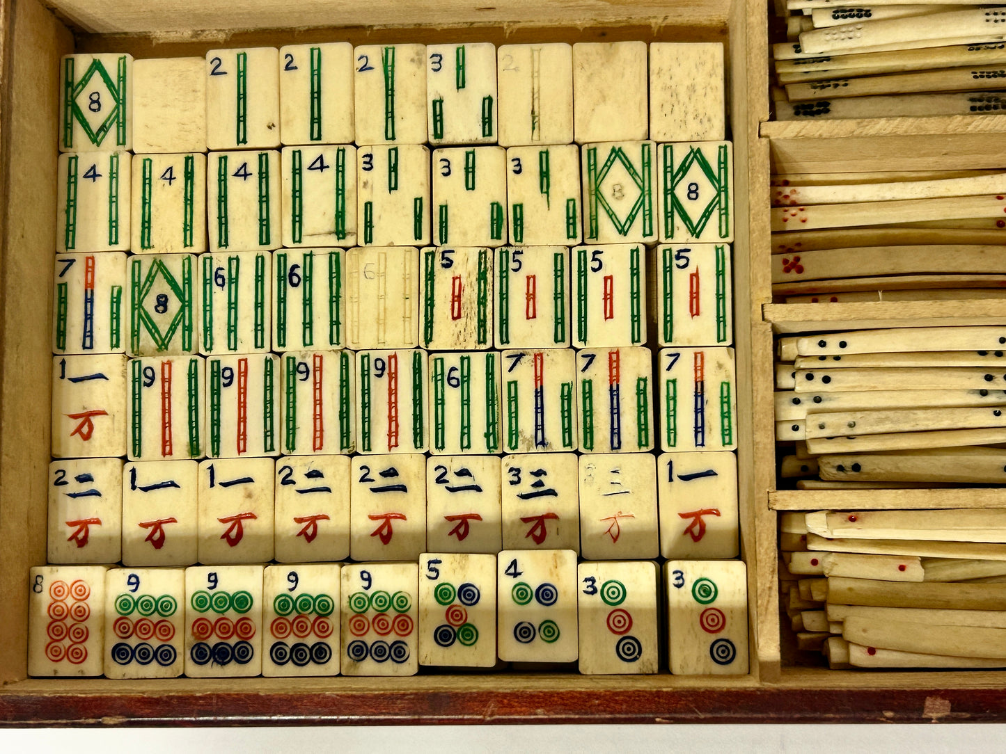 ANTIQUE MAHJONG SET WITH 145 BONE TILES