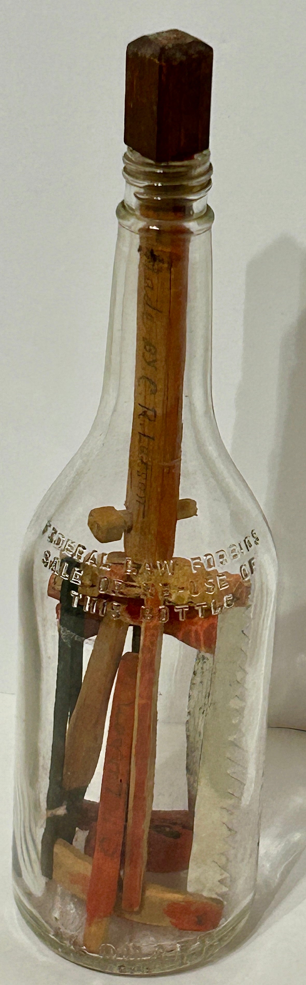 FOLK ART CARVED TOOLS IN BOTTLE