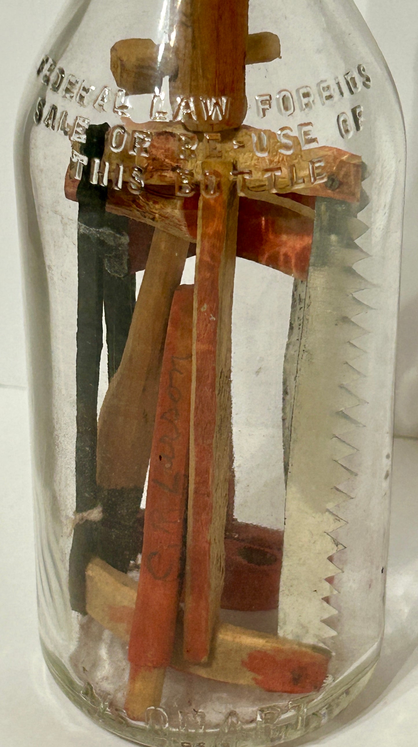 FOLK ART CARVED TOOLS IN BOTTLE